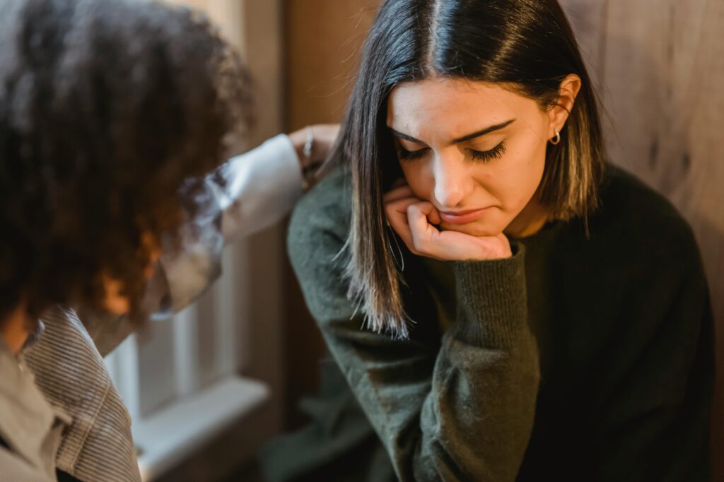 A friend consoling.